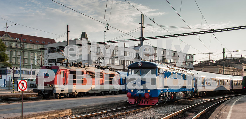 LPAP-EUR-CO-0039 
 Slovak electric 350001 stands alongside 751002 at Brno Hlavni Nadrazi, 6th July 2013. 
 Keywords: Czech, Czechoslovakia, Passenger, Colour, 2013