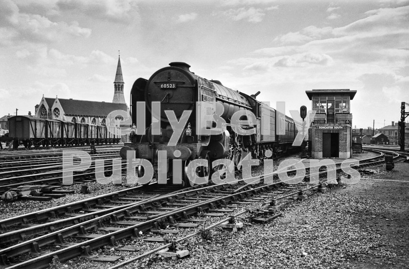 LPIS STM BW NEGS 0120 
 Thompson A2 60523 'Sun Castle' approaches Doncaster station with the 13.08 Grantham to Doncaster service on 8th September 1962. 
 Keywords: 'Sun Castle', 1962, 36A, 523, 60523, A2, BR, Black and White, Doncaster, Eastern, LNER, Passenger, Steam, Thompson, Yorkshire