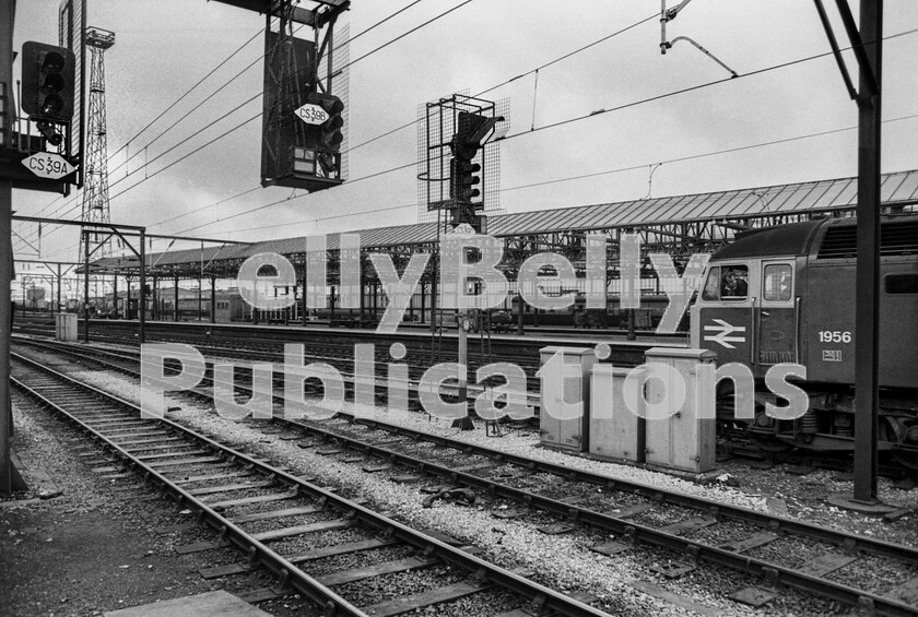 LPPC DSL BW 0361 
 Sunday sequence at Crewe - 3. The Class 47 number 1956 is now coupled up to 1A28 the Sunday morning 09.06 Liverpool Lime Street to Euston and brake tests have been carried out, so it is ready to go. The driver is looking back for the Right Away anxious to get on the move. Once the ensemble has departed south the extensive station will fall silent until the next northbound WCML train arrives to detach its diesel or a pilot from the adjacent TMD and will undertake the same moves as our featured train. 
 Keywords: Digital, Rights Managed, Stock