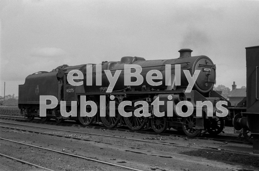 LPIS STM BW NEGS 0171 
 Stanier 5MT 45275 is seen at its home shed of Chester (6A) in 1956. 
 Keywords: 6A, 45275, 5MT, BR, Black and White, Midland, Chester, LMS, Shed, Bullied, Steam