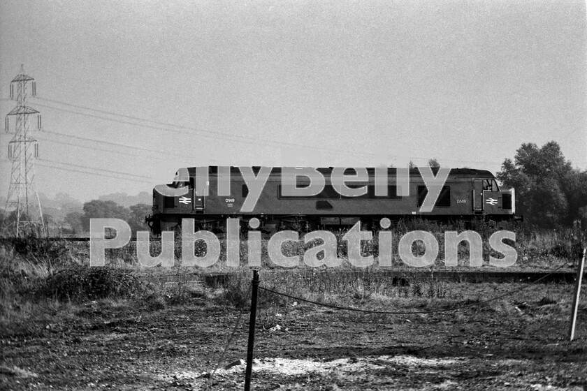 LPPC DSL BW 0281 
 On the day in 1971 that British Rail finally relented and agreed to allow the first steam-hauled train to run on its tracks since the summer of 1968, whilst paying a visit to the Didcot Steam Centre in order to observe King Class 6000 King George V run past, this Peak Class 46 number D149 (later 46012) rolled into view light-engine, heading in the down direction towards Oxford. The loco carries an intermediate rail-blue livery as the numbers are still prefixed with Ds. 
 Keywords: BR, Western, D149, 46012, Light Engine, Peak