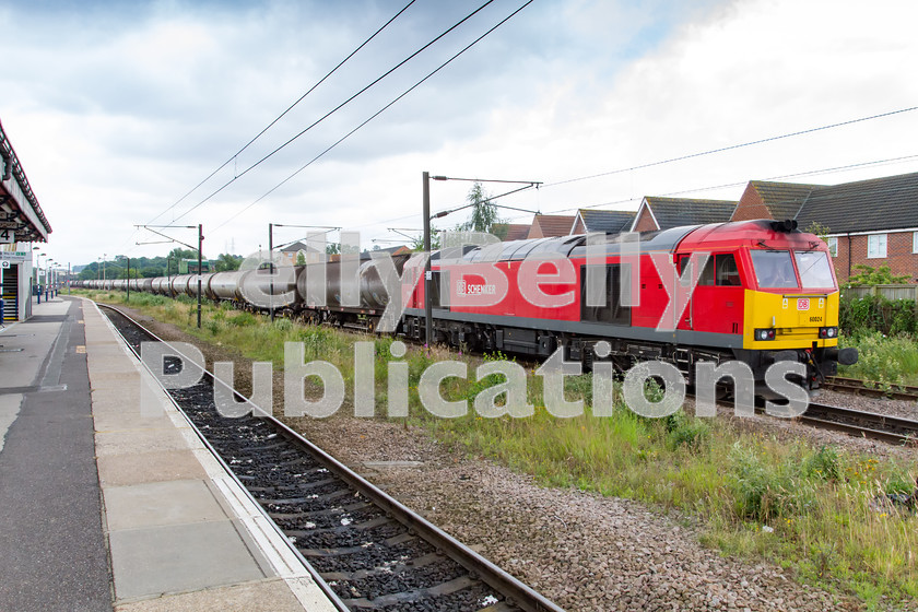 LPIS-D-DSL-CO-0051 
 DB Schenker Class 60, 60024, waits to depart Grantham with 6E82 from Rectory Lane to Lindsey Oil Refinery. 
 Keywords: 60024, 6E82, Class 60, DB Schenker, Digital, Freight, Grantham, Lincolnshire, Oil, Rights Managed, Stock