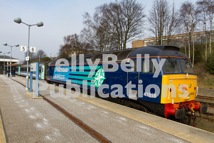 LPIS-D-DSL-CO-0011 
 DRS Class 47, 47818, waits to depart Norwich with 2P20, the 12:36 service to Great Yarmouth on 14th March 2014. 
 Keywords: 47818, Abellio, Class47, DRS, Digital, East Anglia, Greater Anglia, Norfolk, Norwich, Passenger, Rights Managed, Stock