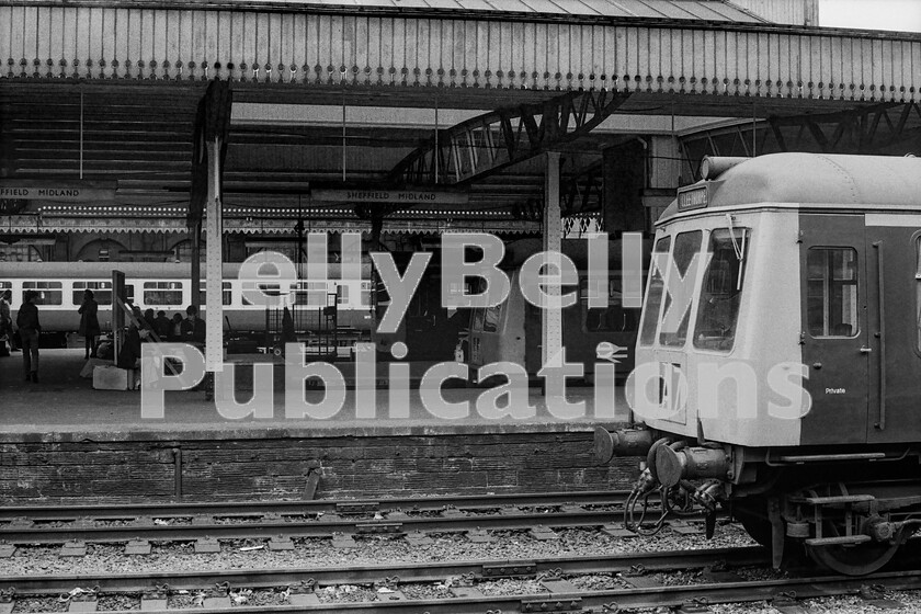 LPPC DSL BW 0939 
 Sheffield Midland station looking from Platform 6 towards the main entrance. The closest DMU is stabled in the tracks between Platform 5 and Platform 4, which are still used today for the same purpose. Another BR Derby Class 105 sits in one of the northbound bay platforms alongside a Class 104 originally a Calder Valley unit as they were built with more power specifically for that line. The Mk2 coaching stock on Platform 1 looks to be from a terminated service from London St Pancras.