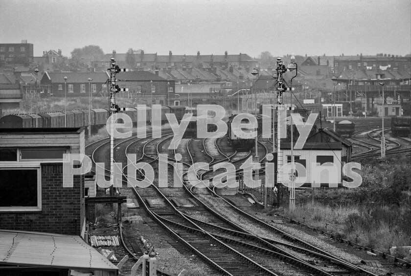 LPPC DSL BW 0978 
 Perhaps this picture should be a what and where quiz question, it being a very little-known backwater tucked into the extremely complex track arrangements around and adjacent to Willesden Junction. When taking the shot, immediately behind me was Old Oak Junction. This is the point of divergence of what is now the Overground line from Richmond to Willesden Junction and beyond with the route you are looking at. It is freight only and leads around to the right to West London Junction, connecting with the West Coast main-line and enabling continuing round to Mitre Bridge Junction and the south. As can be seen it is rarely used and on this particular cold Saturday morning the Sulzer Type 2 Class 25 clanked away to itself, idling without moving for more than an hour or two. At least that provided current enough to boil the crews kettle. 
 Keywords: Digital, Rights Managed, Stock