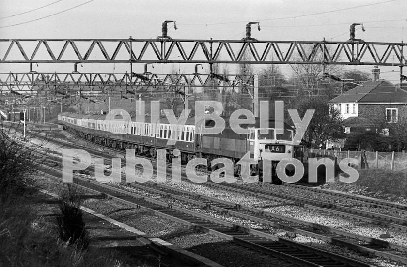 LPIS DSL BW NEGS -0004 
 Brush Type 4 1840 (later 47190) has just passed Mossley Hill on the outskirts of Liverpool with the 14:45 1A61 Liverpool Lime Street to London Euston service some time in the early 1970s. 
 Keywords: 1840, 1A61, 47190, BR, Black and White, Class47, Date Unknown, Diesel, LMS, Liverpool, London Midland, MOssley Hill, Passenger