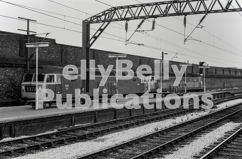 LPPC DSL BW 0433 
 The evolution of the species. Two Brush Type 4 Class 47s sidle their way around the back of the up side at Crewe returning light-engine to Crewe DED. The two locos display liveries representing the first and the then latest colour schemes of original duo-tone green and the latest rail blue whilst the train-spotter on the trolley must have seen both many times before. on 23rd May 1970, the Britannia bridge across the Menai Straits connecting mainland Wales and Anglesey was seriously damaged by fire causing the main line to Holyhead to be closed. D1851 was one of three Class 47s stranded at Holyhead, the others being D1724 & D1940. All three were later moved by sea across to Barrow-in-Furness. 
 Keywords: Digital, Rights Managed, Stock