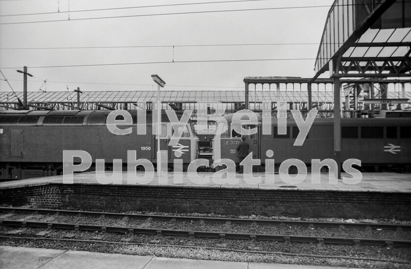 LPPC DSL BW 0362 
 Sunday sequence at Crewe - 2. It is a Sunday afternoon at Crewe in the early 1970s and then, as now, engineering works require the use of diesels to drag electrically-powered trains over diversionary routes. This was a weekend when all West Coast expresses were diverted via Cannock and Walsall so Brush Type 4 Class 47 number 1956 has coupled up to AL6 Class 86 number E3176 to haul the loco and train , seen on the previous page, as far as Birmingham. 
 Keywords: Digital, Rights Managed, Stock