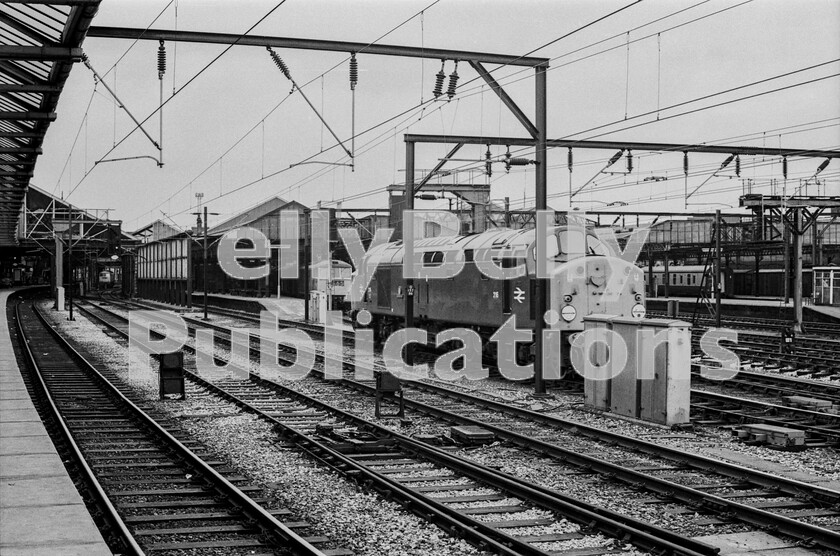 LPPC DSL BW 0431 
 The south end of Crewe again, but this time revealing an immaculate English Electric Type 4 Class 40 and one of the named examples, number 216 Campania. It is absolutely immaculate down to white-painted wheel rims and it is easing forward, making that characteristic ringing sound and heading for Crewe TMD for fuelling and servicing having arrived, it being a Saturday, on 1A78 from Holyhead. Here it is giving way to electric power for the trains onward journey to Euston. By November 1973 the loco would be renumbered 40016. 
 Keywords: Digital, Rights Managed, Stock