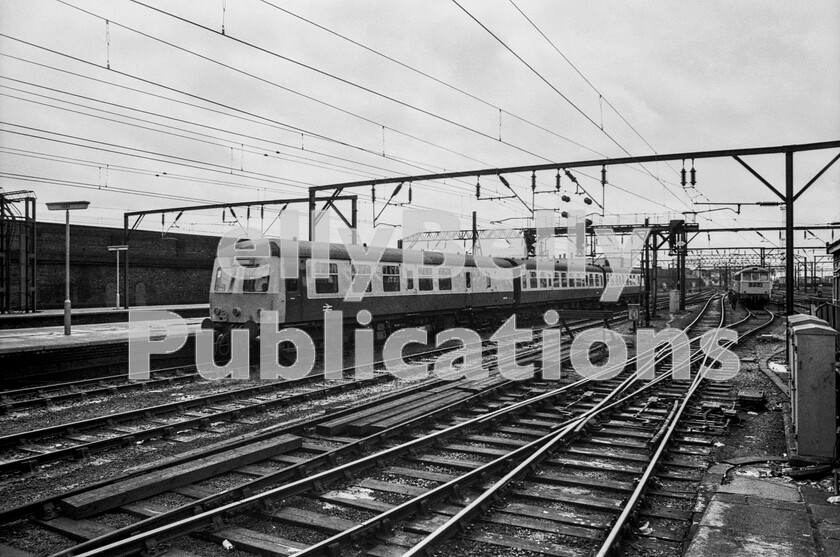 LPPC DSL BW 0363 
 Underlining just how versatile the Swindon-built Cross Country 120 dmus were and how essentially right for the task the design was, as well as east to west services on the Birmingham to Lincoln axis and prior to the restoration of loco-hauled trains on the route, they were the mainstay of the so-called North and West Route which had been created by the GWR to carry its traffic between the industrial areas of South Wales and the North West. So, this unit, arriving at Crewe, will have come from Cardiff via Newport, Hereford, Shrewsbury and Whitchurch. On the right is the loco siding holding electric engines ready to take over up services powered by diesels on their journeys south.