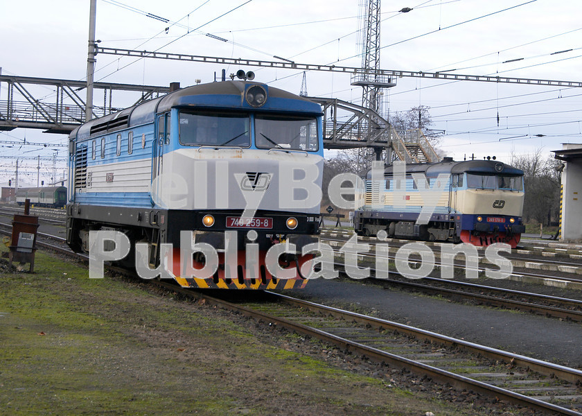 LPAP-EUR-CO-0002 
 Similarly liveried, but with 749259 to the left being unsilenced, and 178 having a silencer, at Prostejov, 2nd January 2005. 
 Keywords: Czech, Czechoslovakia, Passenger, Colour, 2005