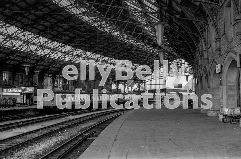 LPPC DSL BW 0707 
 The majesty of the overall roof at Bristol Temple Meads station, attributed variously to Francis Fox and P E Culverhouse, dwarfs the 3 car Pressed Steel Class 118 DMU as it idles away, awaiting time to depart for Cardiff Central. Note the GW style Automatic Train Control ramp between the rails in the foreground. 
 Keywords: BR, Class 118, B477, Bristol Temple Meads, Western, Passenger, Station