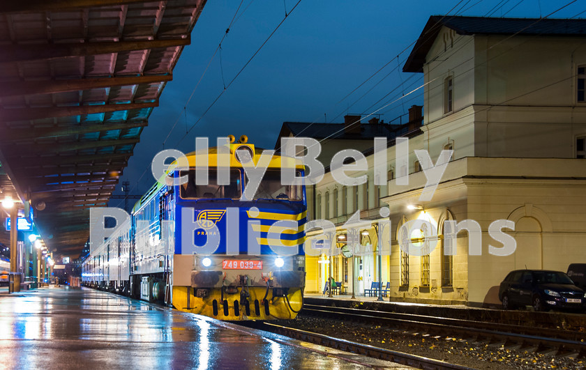 LPAP-EUR-CO-0046 
 With ECS from a service from Tanvald, 749039 waits to leave Praha Vrsovice, 24th November 2013. 
 Keywords: Czech, Czechoslovakia, Passenger, Colour, 2013