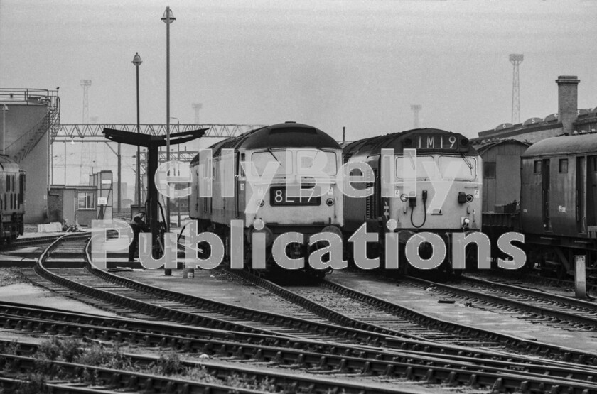 LPPC DSL BW 1244 
 A conundrum; at some point recently the Class 50 has worked the 1M19 13 50 (SO) Glasgow Central to Euston according to this shot of Crewe TMD one afternoon in the summer of 1972. But, it is facing north, so its the wrong way round and turntables werent in use then, nor was there a triangle to my knowledge. It is easier to say that the front Brush Type 4 of the two Class 47s on the left has been engaged in local freight traffic, maybe salt from Middlewich or coal via Madeley Chord Junction. One is being fuelled up by a TMD depot staff member standing under a canopy that looks particularly inadequate in a rainstorm situation. 
 Keywords: Digital, ISO, John Stiles