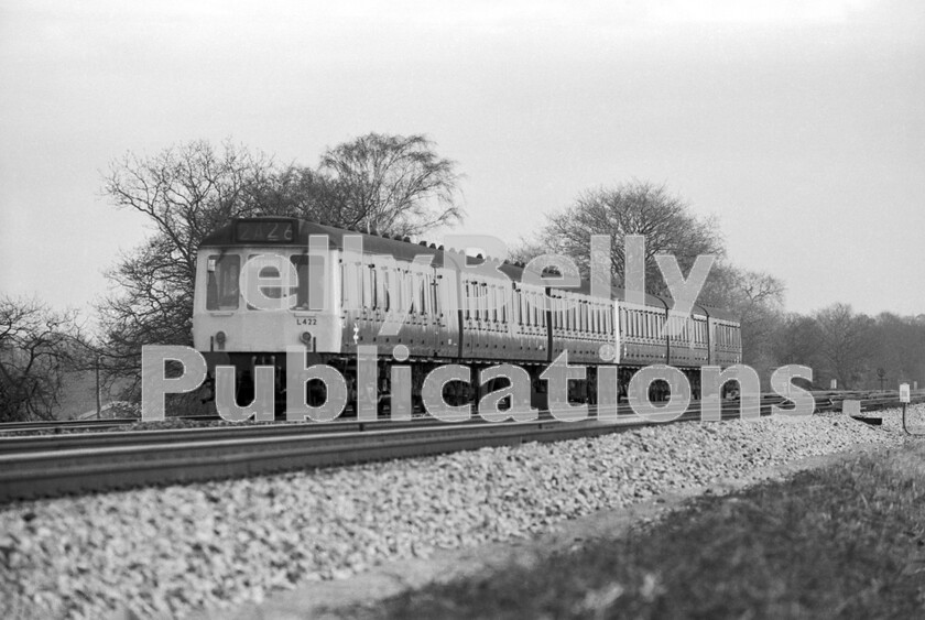 LPPC DSL BW 0439 
 The glamour and high speeds achieved by the trains on the fast lines may eclipse the relief line traffic, but these Pressed Steel 3 car Class 117 DMUs, all allocated to the specialised depot at Southall, plied their trade reliably for decades. Sometimes they were allowed onto the main lines on a rush-hour Oxford semi-fast and picked up their skirts to run at 70mph given the chance. In these circumstances it was advisable not to sit in the front power car to save your hearing and stay in your seat across the junctions at Slough. 
 Keywords: BR, Western, DMU, Class 117, L422, Twyford, Sonning Cutting