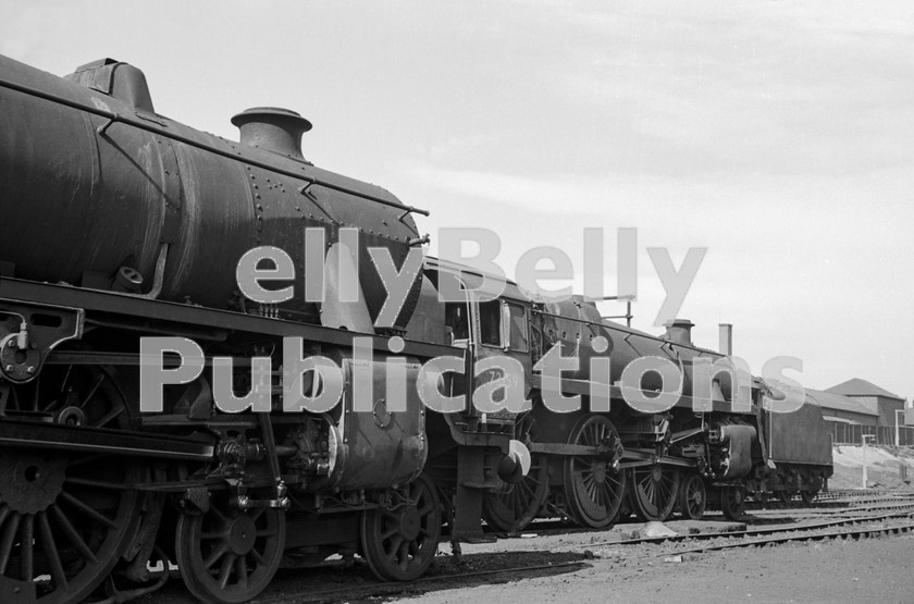 LPIS STM BW NEGS 0103 
 BR Standard Class 5 73159 awaits its next duty at Stockport Edgeley shed. Initial research suggests that as 73159 was based at Patricroft shed (9F) between 1965 and 1967 this is the likely time of the photograph. 
 Keywords: 73159, 9F, Standard 5, BR, Black and White, Midland, MR, Shed, Riddles, Stockport Edgeley, Steam