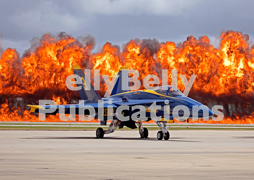 AU8A2419 
 F/A-18C 163439, Blue Angels Number 3 at the 2017 Beaufort Air Show on April 30 2017. The colorful background is down to the Marine Corps Role Demonstration during the show. 
 Keywords: Digital, ISO, John Stiles, F-18, Blue Angels, United States, Beaufort Air Show, 2017