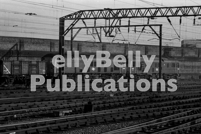 LPPC DSL BW 0548 
 Two Sulzer Type 2s, one a Class 24 number 5061 and the other a Class 24/2 number 5143 clank their way around the east side of Crewe station one summers evening in 1972 with a long string of mineral wagons in tow. The last vestiges of British railway freight working as it was. 
 Keywords: Digital, Rights Managed, Stock