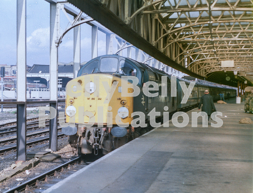 LPAP-DSL-CO-0005 
 40034 has just changed drivers at Manchester Victoria, with a service for the North Wales coast, 7th April 1983. 
 Keywords: BR, Midland, LMS, Manchester, Manchester, Diesel, BR, Passenger, Colour, Class40, 40034, D234, LO, 1983