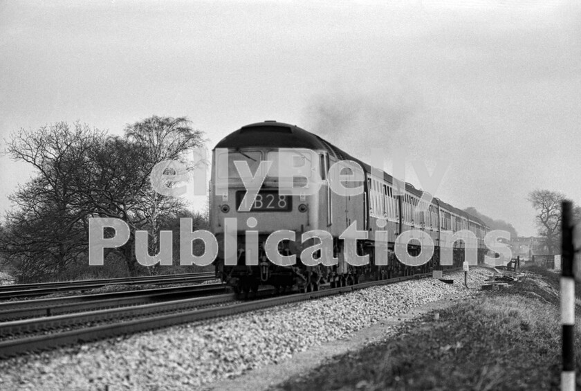 LPPC DSL BW 0442 
 Thundering westwards on Brunels superbly graded main line from Paddington one March morning in the mid-1970s, is a Brush Type 4 Class 47 on an express made up, unusually by this stage, entirely of Mark 1 rolling-stock. The train is the 10.05am 1B28 London to Birmingham via Worcester service. The location is just at the entrance to Sonning Cutting and, in the far background, can be seen Twyford station. 
 Keywords: BR, Western, Passenger, 1B28, Class 47, Twyford, Sonning Cutting