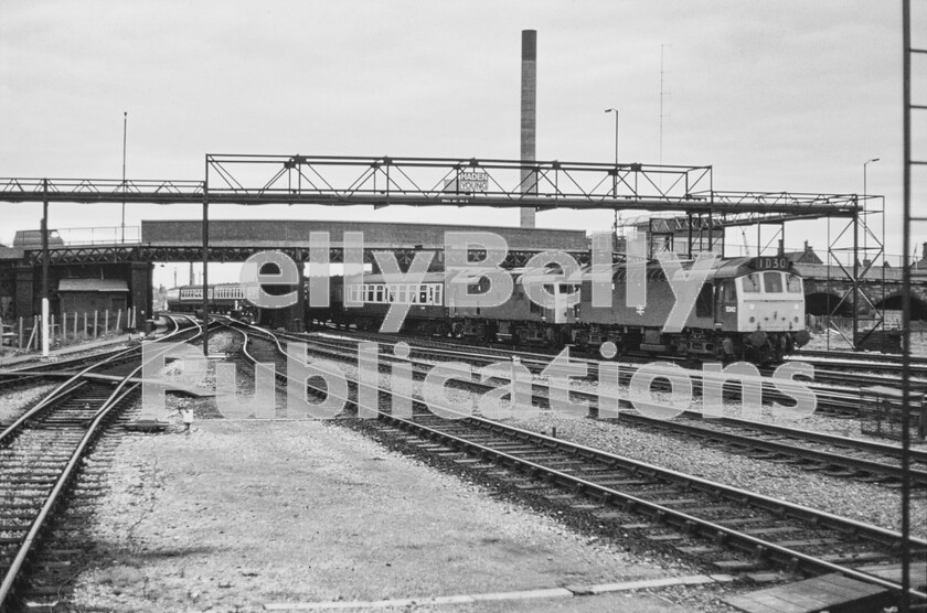 LPPC DSL CO 0098-Edit 
 Nottingham on 5th August 1972 sees 5242 (later 25092) and D5245 (later 25095) entering the station with the ECS of the 07.35 1D30 Nottingham to LLandudno service. The locos worked the train throughout returning to Nottingham with the 13.58 1D17 service from Llandudno. The transition to BR Blue was still underway (at least with locomotives) as D5245 is still in two-tone green. 
 Keywords: Digital, Rights Managed, Stock