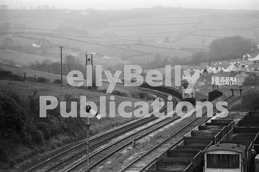 LPPC DSL BW 0909 
 Some idea of the curvature and gradient profile of the Great Western main line west of Plymouth can be formed from this shot of a Class 50 approaching Liskeard with the 12.25pm 1A45 Penzance to London Paddington express. Note how the buffer stop at the end of the level engineers siding is virtually at the same height as the locomotives roof. 
 Keywords: BR, Western, Hoover, Class 50, 1A45, Liskeard, Passenger