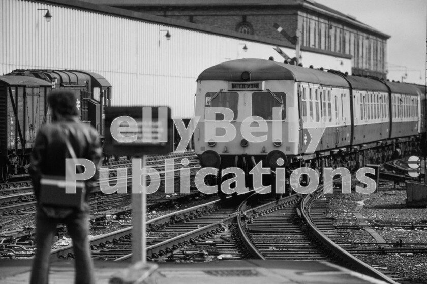 LPPC DSL CO 0133-(2)-Edit 
 Under the watchful eye of an enthusiast a cross-country, in the strictest sense of the term, six-car DMU made up of two three-car Swindon-built Class 120 units approaches Leicester station, one of the more important stops on the long, regular, journey across middle England from Lincoln to Birmingham in 1973. This journey involved a trip via Newark Castle, Nottingham and Trent Junction before Leicester. Onwards the trip continued via Nuneaton before the run into Birmingham. On the left, traditionally acting as yard pilot, as they were designed to do, a BR 350hp Class 08 shunter that was a Leicester asset all its life, number 3786 (later 08619), trundles a box-van towards others as it makes up a fitted van train for onward transit. 
 Keywords: Digital, Rights Managed, Stock