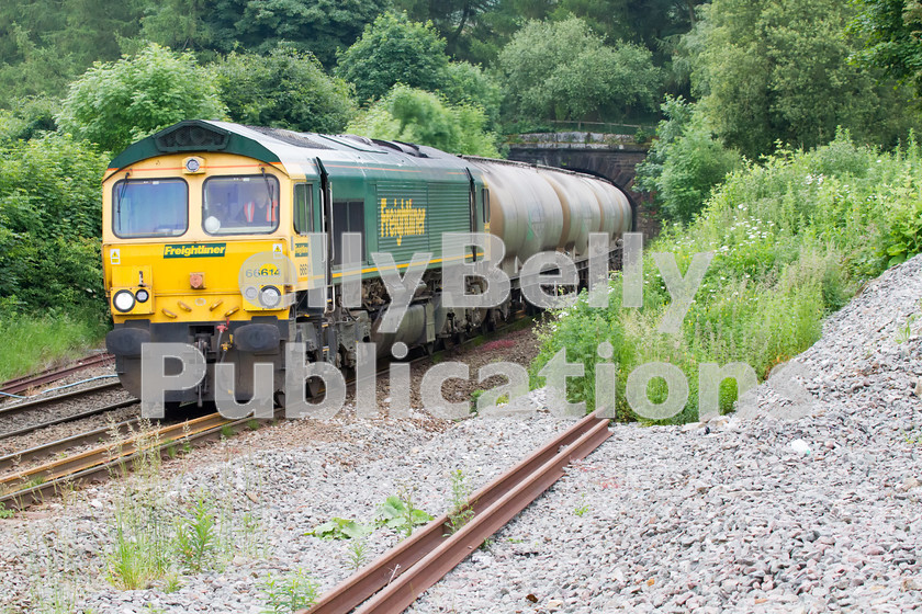 LPIS-D-DSL-CO-0036 
 Freightliner Class 66, 66614, leaves Dove Holes Tunnel beneath Chapel-en-le-Frith station with 6L89 Tunstead to West Thurrock limestone train on 18th June 2014. 
 Keywords: 66614, Chapel-en-le-Frith, Class 66, Derbyshire, Digital, Dove Holes Tunnel, Freight, Freightliner, Minerals, Rights Managed, Stock