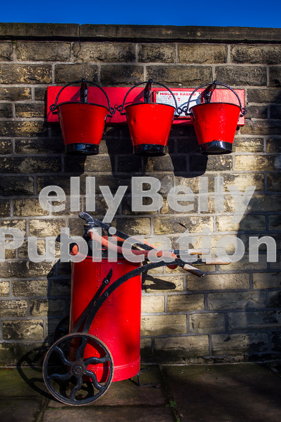 LPISD-STM-CO-0008 
 The Oakworth Station Fire Fighting equipment catches the early morning sun during the Autumn Steam Gala on October 10th 2014. 
 Keywords: Preserved, Eastern, LNER, Yorkshire, Oakworth, 2014