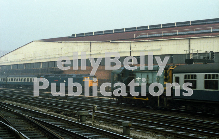 LPAP-DSL-CO-0037 
 47508 'SS Great Britain' enters Paddington as 08744 takes ECS out, 20th February 1984. 
 Keywords: BR, Western, GWR, London, Paddington Diesel, BR, Passenger, Colour, Class47, 47508, D1952, LE, Class08, 08744, D3912, SP, 1984