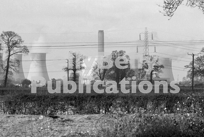 LPPC DSL BW 1284 
 Not much of what is going on here survives today as D1048 Western Lady continues to trundle its empty coal hoppers west towards Didcot. As an inevitable result of trying to clean up our environment, the power-station, cooling towers, locomotive and the hopper wagons have all exceeded their sell-by dates and been eliminated. The train itself will soon turn right to head north, back to the coalfields for the wagons to be replenished and returned to the House Coal Concentration Depot at Hayes..and thats gone too, having been opened with great fanfare in the early 1960s by no less then Dr Beeching himself. 
 Keywords: BR, Western, Class 52, D1048, 'Western Lady', Freight, Didcot