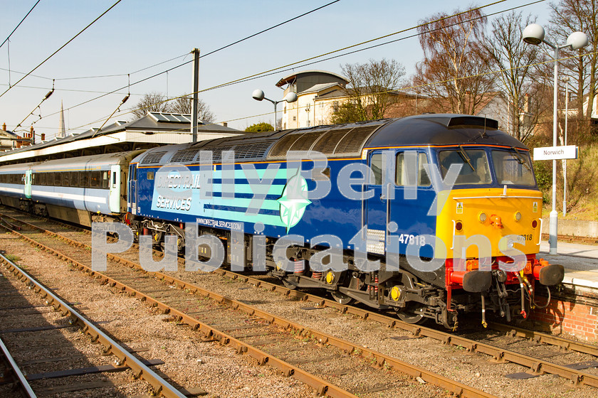 LPIS-D-DSL-CO-0012 
 DRS Class 47, 47818, rests at Norwich having arrived from Great Yarmouth with 2P21, the 13:17 service from Great Yarmouth on 14th March 2014. 
 Keywords: 47818, Abellio, Class47, DRS, Digital, East Anglia, Greater Anglia, Norfolk, Norwich, Passenger, Rights Managed, Stock