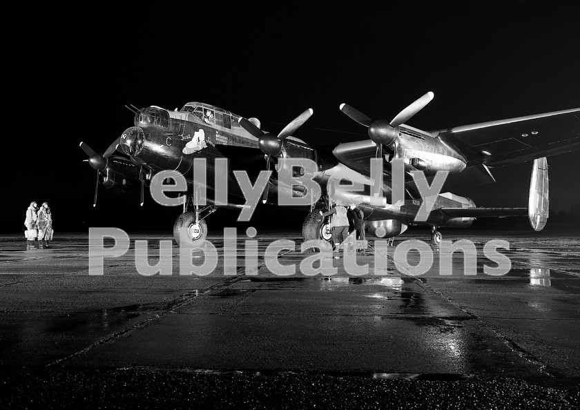 IMG 6168-1-copy 
 A re-enactment at East Kirkby Airfield of Avro Lancaster NX611 'Just Jane' preparing for with a variety of bombs. March 17th 2012. 
 Keywords: Digital, ISO, John Stiles