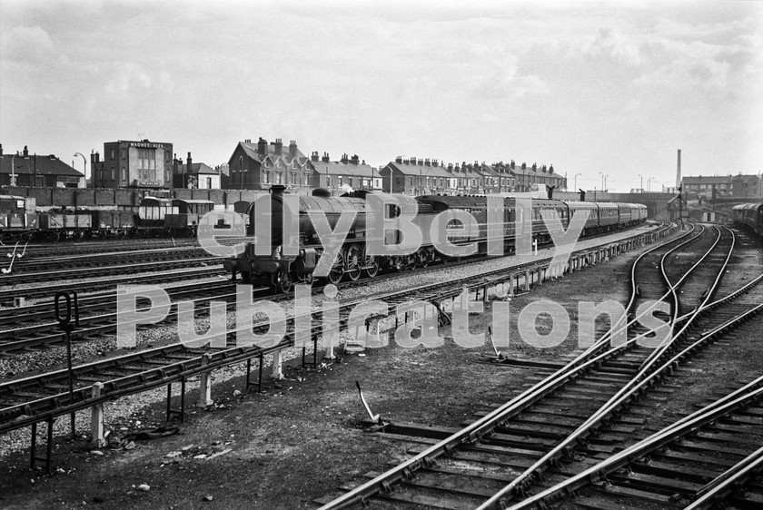 LPIS STM BW NEGS 0130 
 York based Raven B16 61448 approaches Doncaster with a King's Cross to York service on 8th September 1962. This unusual working was as a result of the Offord accident involving Peppercorn A1 60123 the previous day. 
 Keywords: 1448, 1962, 2377, 50A, 61448, B16, BR, Black and White, Doncaster, Eastern, LNER, Passenger, Raven, Steam, York, Yorkshire