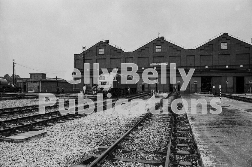 LPPC DSL BW 0369 
 A wet summer Sunday in 1972 at Crewe Works. All is quiet and a lone immaculate and repainted Brush Type 4 Class 47 number 1648 has emerged from the Loco Repair Shop, probably on the previous Friday afternoon and it is waiting for the resumption of work on Monday morning to be tested and checked over as ready to return to service. One of the few Class members still running today, it has lived a schizoid life having had three different identities since this shot was taken. In 1974 it became 47064, then that was altered to 47639 before finally being renumbered 47851. 
 Keywords: Digital, Rights Managed, Stock