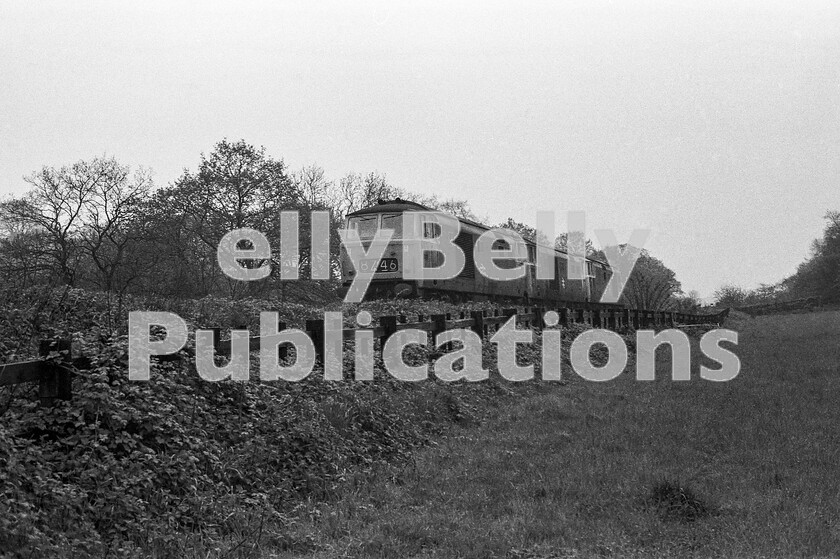 LPPC DSL BW 1271 
 The Lickey Incline was a mecca for enthusiasts in steam days and actually didnt lose a lot of its appeal thereafter. The sight and sound of a Class 47 working at its limits on a miserably wet Friday afternoon with over 1000 tonnes of oil hung behind it as it headed laboriously towards Blackwell was actually pretty impressive. Even better, Hymek Type 3 Class 35s (and Class 37s) took over banking duties after the 94XX Pannier tanks had all gone. If you thought one Hymek on full power sounded good, you just had to experience three in multiple. Here, in time-honoured fashion, they roll back down to Bromsgrove afterwards to wait for the next big push. D7023 leads this formation. 
 Keywords: BR, Western, Lickey Incline, Hymek, Class 35, Bankers, D7023, Light Engine