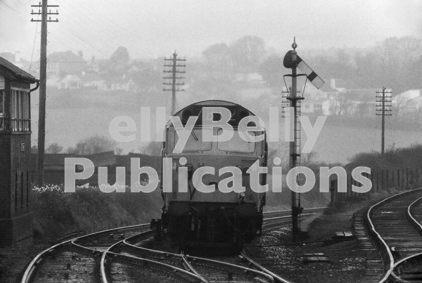 LPPC DSL BW 0904 
 Early on a Saturday morning a Class 50 comes up the hill into St Erth station from the east on a short train of vans. The St Ives branch runs behind the signalbox on the left and the Class 50 is about to be used as the pick-up freight shunting locomotive as seen in the next photograph. 
 Keywords: BR, Class 50, Freight, St Erth, Western,