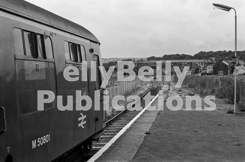 LPPC DSL BW 0560 
 The end of the line, but it hadnt always been this way. This is Colne station platform with a train just arrived from Preston formed of a Class 105 Cravens power twin DMU. At one time early in their careers, DMUs were derided as totally lacking in interest, but as time moved on the sheer variety of them throughout the UK generated its own band of enthusiasts. These 105s were unique in that both of the two cars were powered to cope with the gradients found in the north-west of England. The view ahead shows, curving away to the left, the track bed of where the line used to run before another of the many short-term and pointless closures in the vain expectation of saving some money took place. Until February 1970, the route continued for a further 11.5miles to the large town of Skipton, thus providing a useful through line from Blackburn via Accrington. So short-sighted was this decision that many houses have since been built in the area and there is a growing demand to reopen the route to relieve the inevitable road congestion that has arisen.