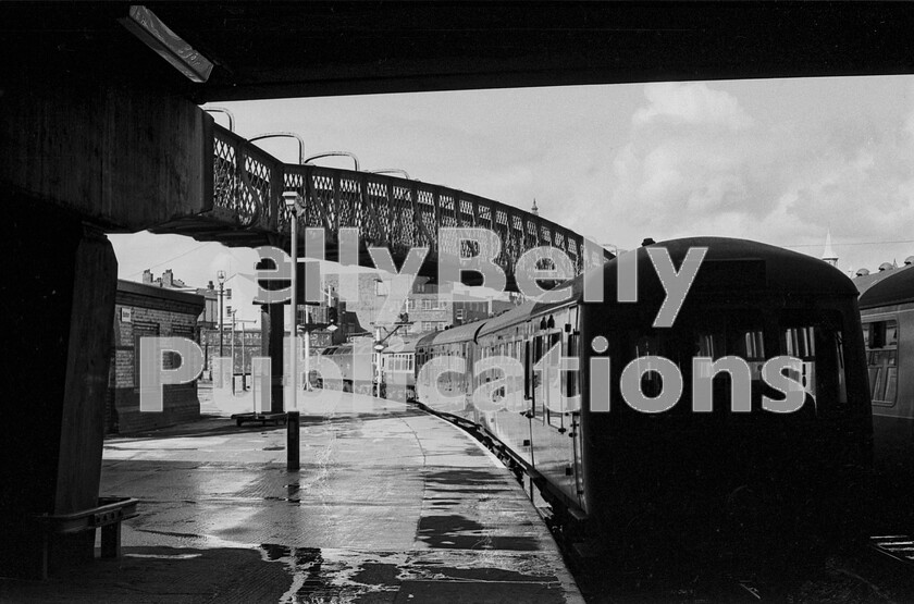 LPPC DSL BW 1189-Edit 
 We can now watch the northbound departure from Bolton of the previous pages Brush Type 4 Class 47, heading its train towards Preston, the next stop. The extremely elevated and long footbridge should be noted whilst the two-car Class 108 DMU in the bay is waiting for the road to turn right on an all-stations service to Blackburn.