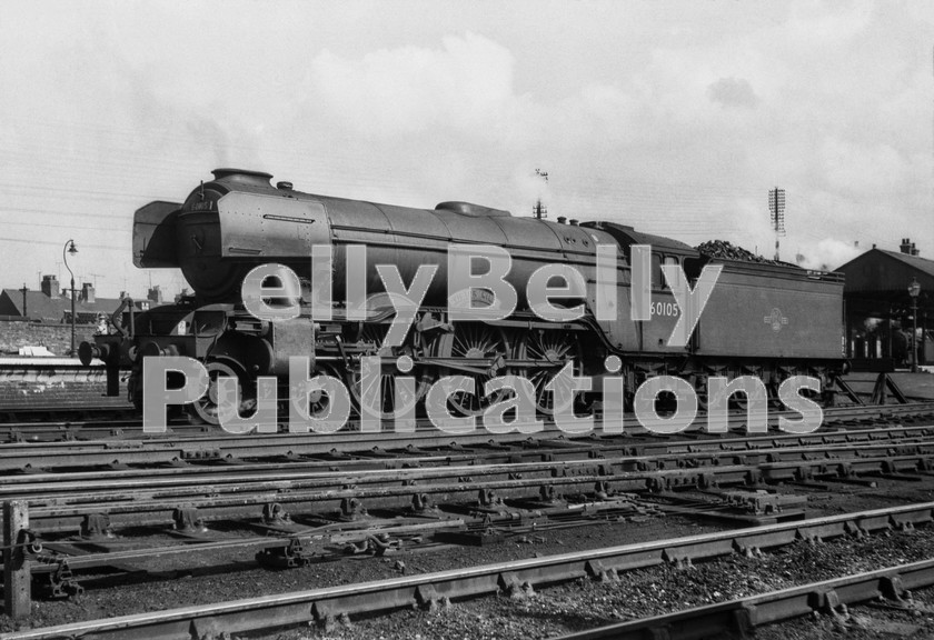 LPIS STM BW 0912 
 Gresley A3 60105 'Victor Wild' simmers outside its home shed of Grantham (35B) in April 1961. 
 Keywords: 35B, 60105, 'Victor Wild', A3, BR, Black and White, Eastern, Grantham, ER, Shed, Gresley, Steam