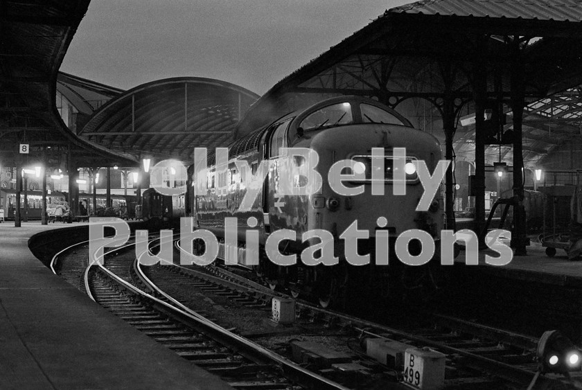 LPIS DSL BW NEGS 0047 
 EE Class 55 Deltic 55013 'The Black Watch' waits departure from Newcastle Central with the 10:35 Aberdeen to Kings Cross service on 23rd December 1975. 
 Keywords: EE,Class 55,Deltic,Newcastle,BR,Eastern,Passenger,1975,D9013,9013,55013,B&W