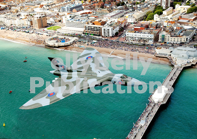 IMG 9190-copy 
 Avro Vulcan XH558 flies low over Worthing Pier on August 15th 2015. 
 Keywords: Digital, ISO, John Stiles