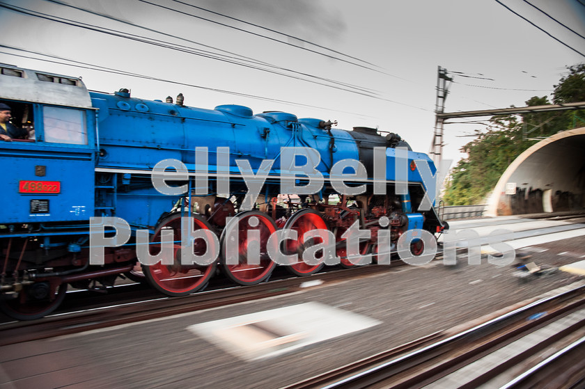 LPAP-EUR-CO-0017 
 Czech Railways 4-8-2, class 498 steam loco is panned at speed leaving Praha Hlavni Nadrazi with a special, 1st October 2011. 
 Keywords: Czech, Czechoslovakia, Passenger, Colour, 2011