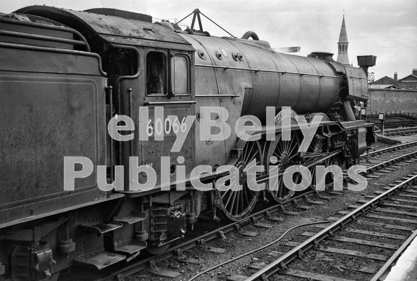 LPIS STM BW NEGS 0122 
 Gresley A3 60066 'Merry Hampton' waits at Doncaster to take over 1E10, the 12.38 Leeds to King's Cross service on 8th September 1962. 
 Keywords: 'Merry Hampton', 2565, 34A, 534, 60066, 66, A4, BR, Black and White, Doncaster, Eastern, Gresley, King's Cross, LNER, Light, Steam, Yorkshire