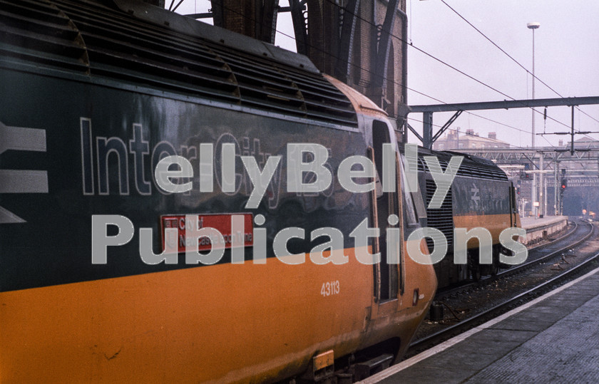 LPAP-DSL-CO-0028 
 HST 43113 'City of Newcastle Upno Tyne' and another Class 43 wait to head north from Kings Cross, 31st August 1983. 
 Keywords: BR, Eastern, LNER, London, Kings Cross, Diesel, BR, Passenger, Colour, Class43, HST, 43113, NL, 1983