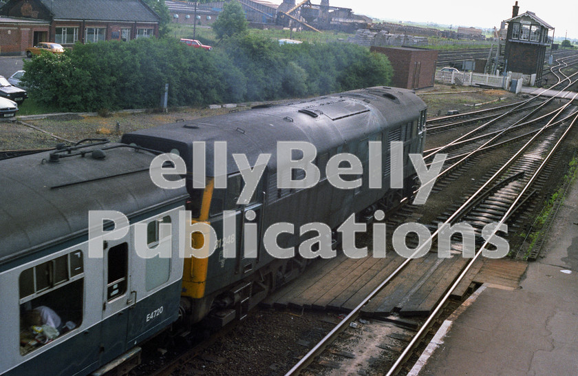 LPAP-DSL-CO-0063 
 Departing March, is 31248 (still with tablet catcher space in it's door) on the Chesterfield - Yarmouth Saturday's only service, 23rd June 1984. 
 Keywords: BR, Eastern, LNER, Cambridgeshire, March, Diesel, BR, Passenger, Colour, Class31, 31248, D5676, FP, 34G, 1984