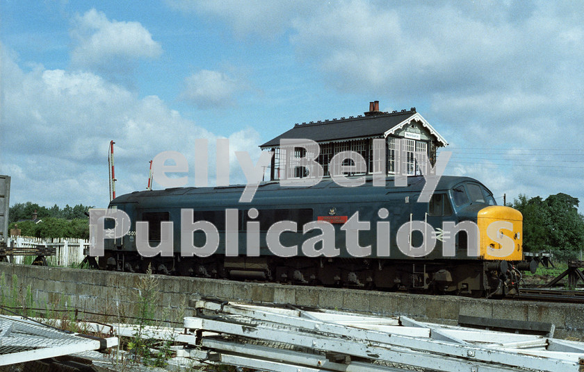 LPAP-DSL-CO-0077 
 Stabled by March East Jn signal box, is 45006 'Honourable Artillery Company', 28th July 1984. 
 Keywords: BR, Eastern, LNER, Cambridgeshire, March, Diesel, BR, Shed, Colour, Class45, 45006, D89, TI, 1984