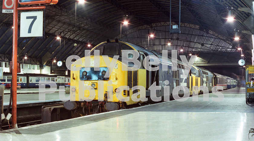 LPAP-DSL-CO-0143 
 Sitting in Glasgow Queen Street high level's platform 7, 37424 and 422 have brought in the last ever booked 1D15 Fort William - Mossend sleeper (which went forward to London), 22nd January 1989. The following day this was booked via Glasgow Central. 
 Keywords: BR, Midland, LMS, Scotland, Glasgow, Diesel, BR, Passenger, Colour, Class37, 37422, D6966, SF, 37424, D6979, CF, 1989