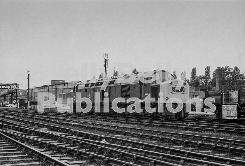 LPPC DSL BW 0368 
 The penultimate English Electric Type 4 Class 40 to be built, number 398, (later 40198) still in green livery with BR heraldic device, in the early 1970s, waits silently in the yard of Crewe Works, probably prior to an overhaul and repaint in rail-blue. But note that the cab doors appear to be wired shut to inhibit any entry and it would seem that an inspection door in the bodywork side is either open or been removed suggesting that the loco might have been cannibalised for parts and will not be moving very far in the future. These were huge engines for their power output of only 2000bhp, which was little more than a 7P class steam locomotive but, the costs of running diesel locos instead of steam was considerably less. 
 Keywords: Digital, Rights Managed, Stock