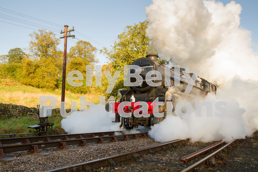 LPISD-STM-CO-0001 
 Stanier Black 5 45305, owned by the 5305 Locomotive Association, moves away from Haworth Shed to pick up coaching stock from Oxenhope carriage sheds for the first trains of the day on Friday October 10th 2014 at the KWVR Autumn Steam Gala. 
 Keywords: Preserved, Eastern, LNER, Yorkshire, Oxenhope, Steam, Stanier, Light Engine, Colour, Black 5, 45305, KWVR, 2014